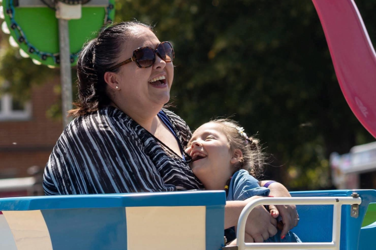 Mother and daughter laughing