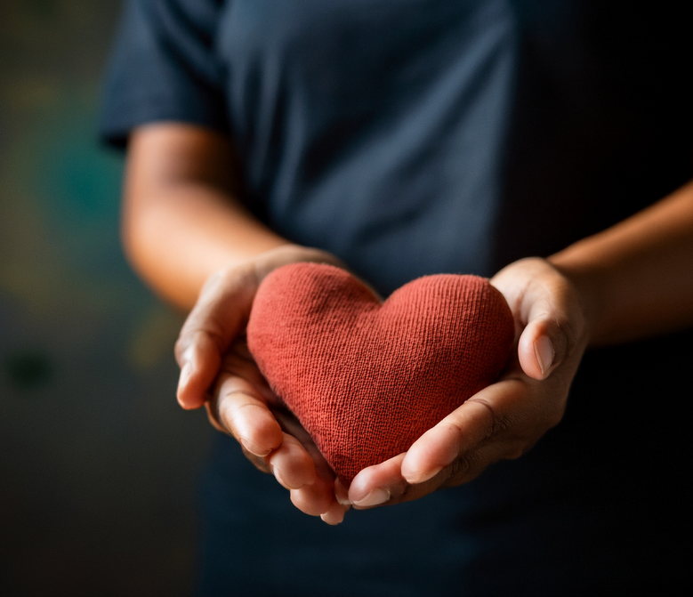 Hands holding a heart