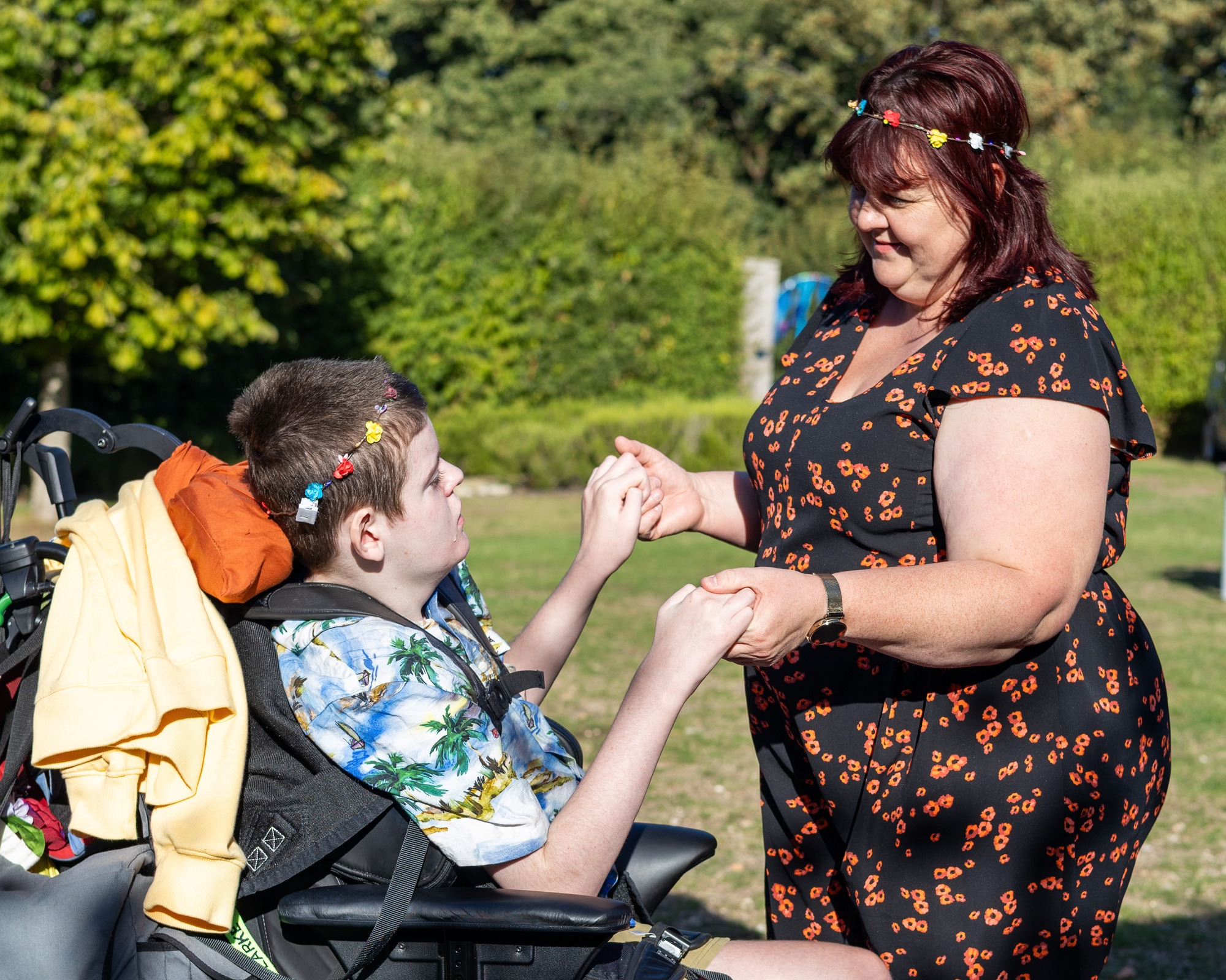 Mother and son holding hands